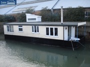 Desirable Small Houseboat